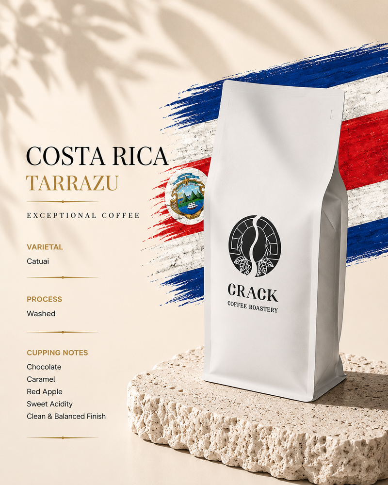 A white coffee bag labeled CRACK COFFEE ROASTERY stands on a textured stone slab against a cream background with Costa Rica flag brushstrokes and coffee product text.